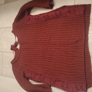Red sweater with lace detail